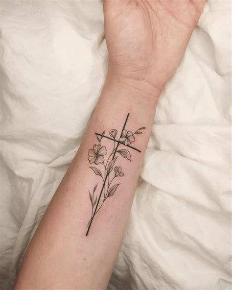 cross flower tattoo